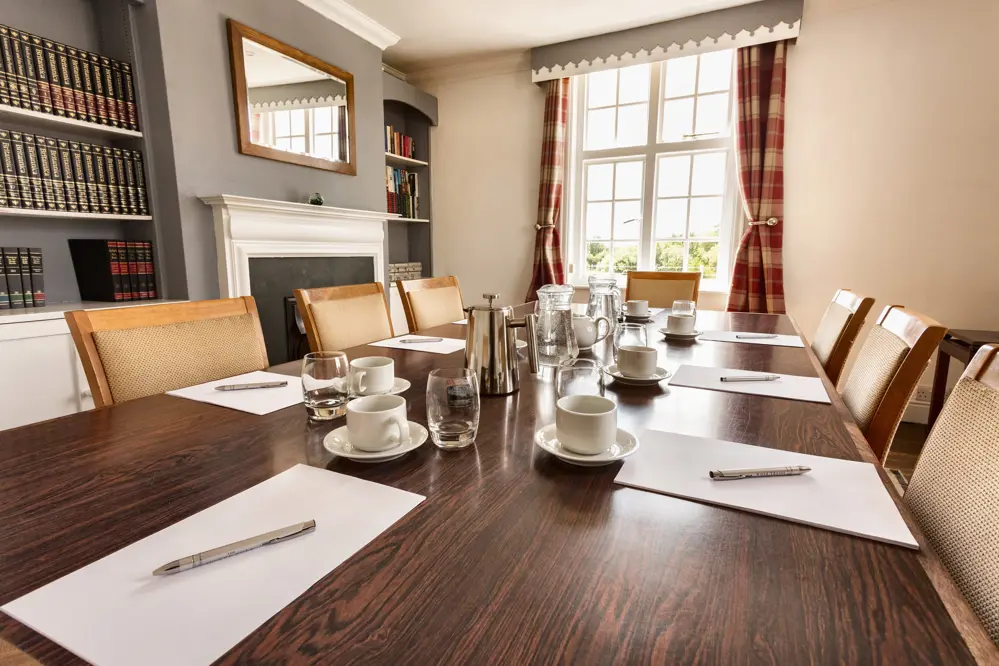 The Library, our boardroom, with the golf course through the window.